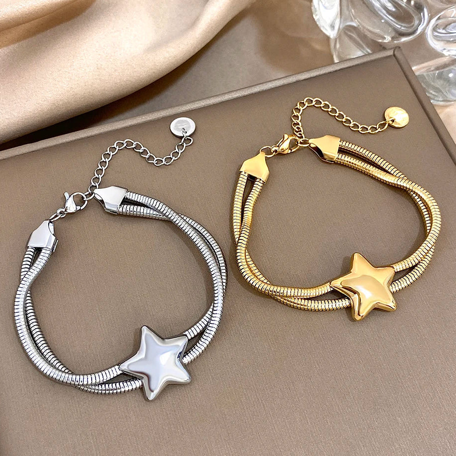 Pulsera de doble vuelta y estrella abombada de plata