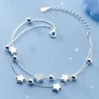 Pulsera de doble vuelta con estrellas plateadas