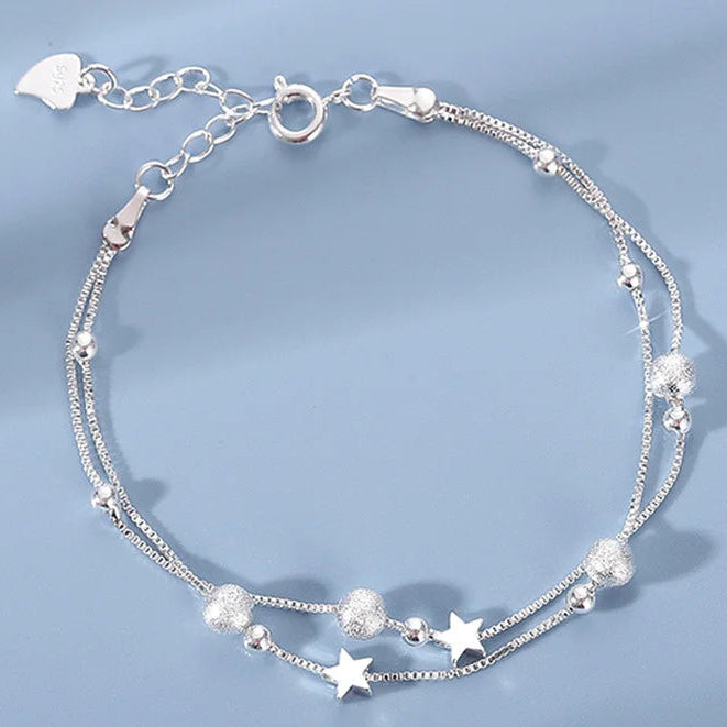 Double-row bracelet with stars and sandblasted beads