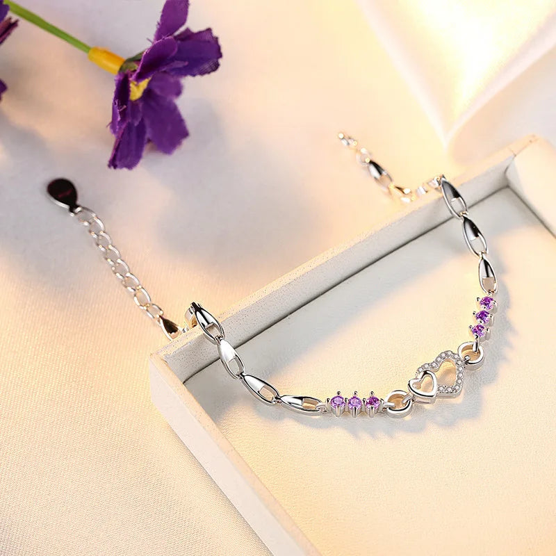  Pulsera elegante con corazón de circonio violeta