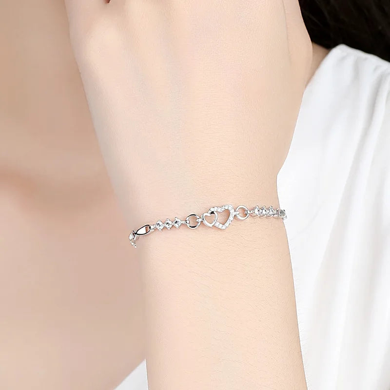 Pulsera elegante con corazón de circonio blanco