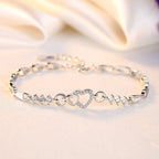 Pulsera elegante con corazón de circonio blanco