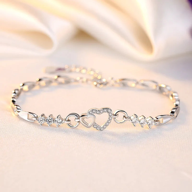 Pulsera elegante con corazón de circonio blanco