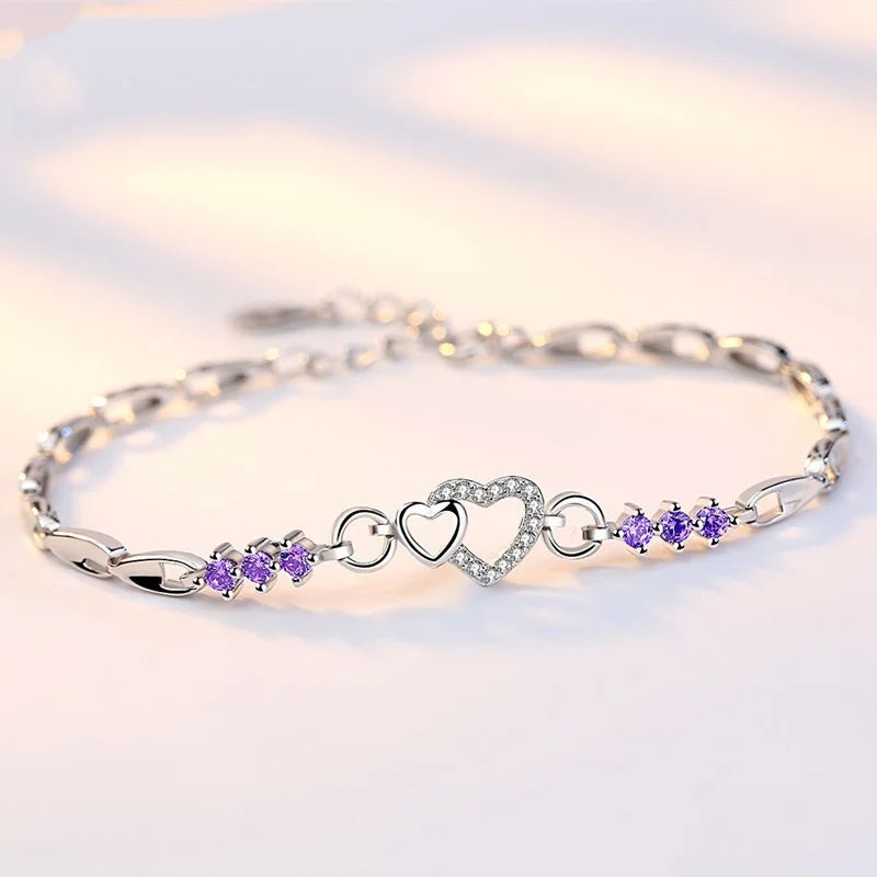 Pulsera elegante con corazón de circonio violeta