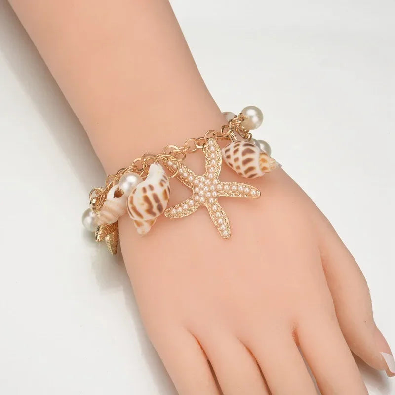 Pulsera Elegante con Conchas dorada