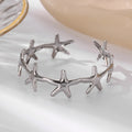 Pulsera Elegante Conchas Estrella de Mar y Vieiras estrella de mar plata