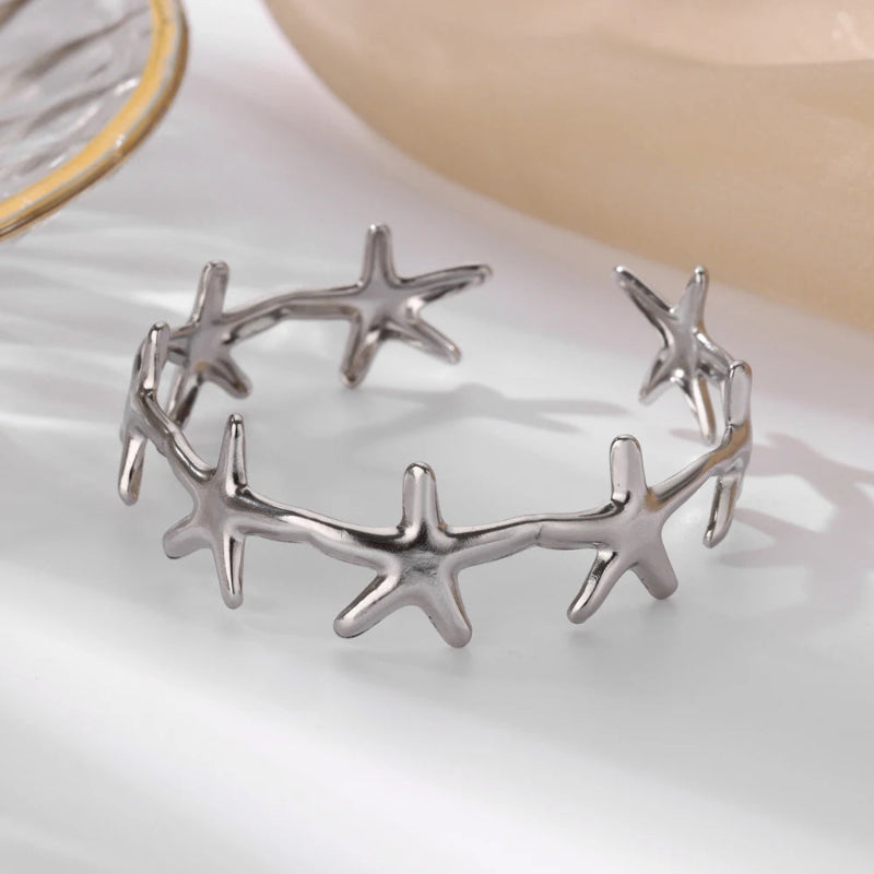 Pulsera Elegante Conchas Estrella de Mar y Vieiras estrella de mar plata