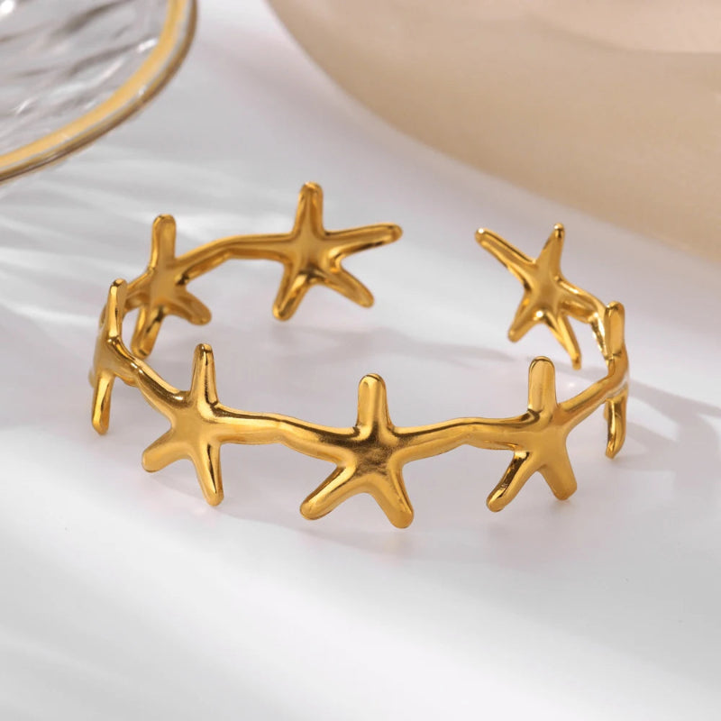 Pulsera Elegante Conchas Estrella de Mar y Vieiras estrella de mar oro