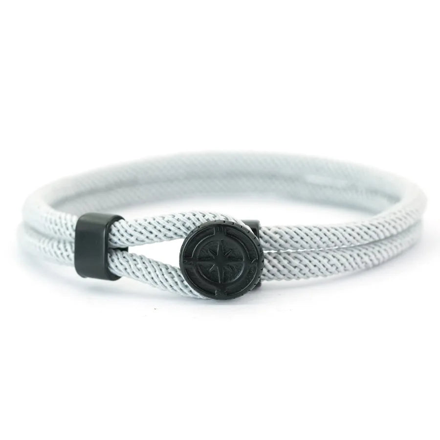 Pulsera de cuerda con brújula negra rosa de los vientos gris
