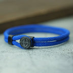 Pulsera de cuerda con brújula negra rosa de los vientos azul rey