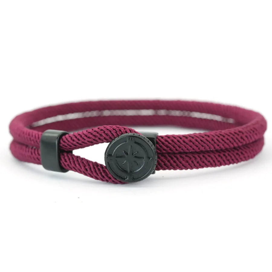 Pulsera de cuerda con brújula negra rosa de los vientos burdeos