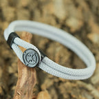 Pulsera de cuerda con brújula negra rosa de los vientos gris