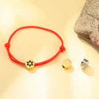 Pulsera de cuerda con el símbolo judío <span data-glossary-id="etoile-de-david">estrella de David</span> rojo y oro
