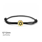 Pulsera de cuerda con el símbolo judío <span data-glossary-id="etoile-de-david">estrella de David</span> negro y oro