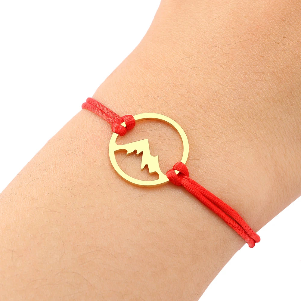Pulsera cuerda con colgante redondo de montaña 
