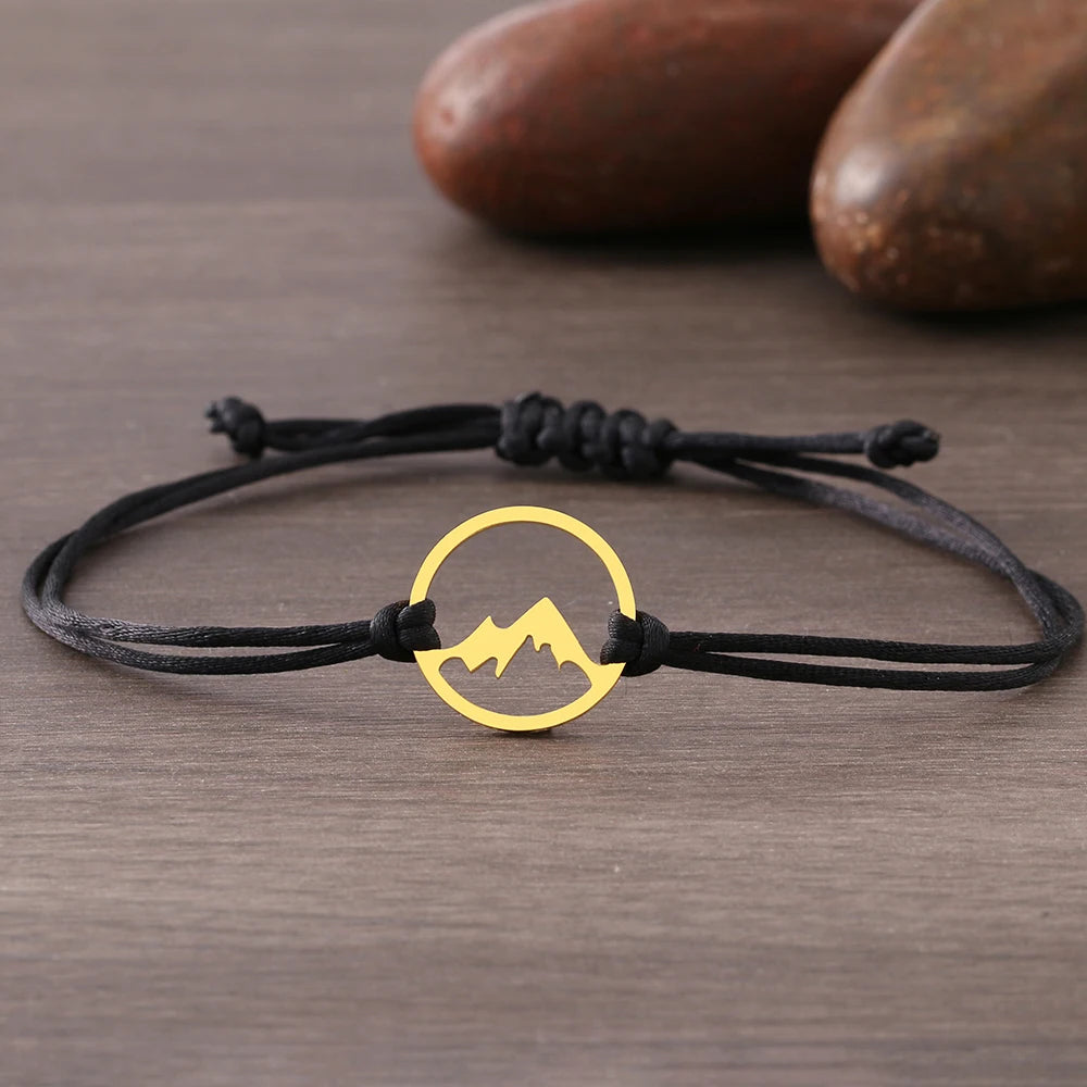 Pulsera cuerda con colgante redondo de montaña 