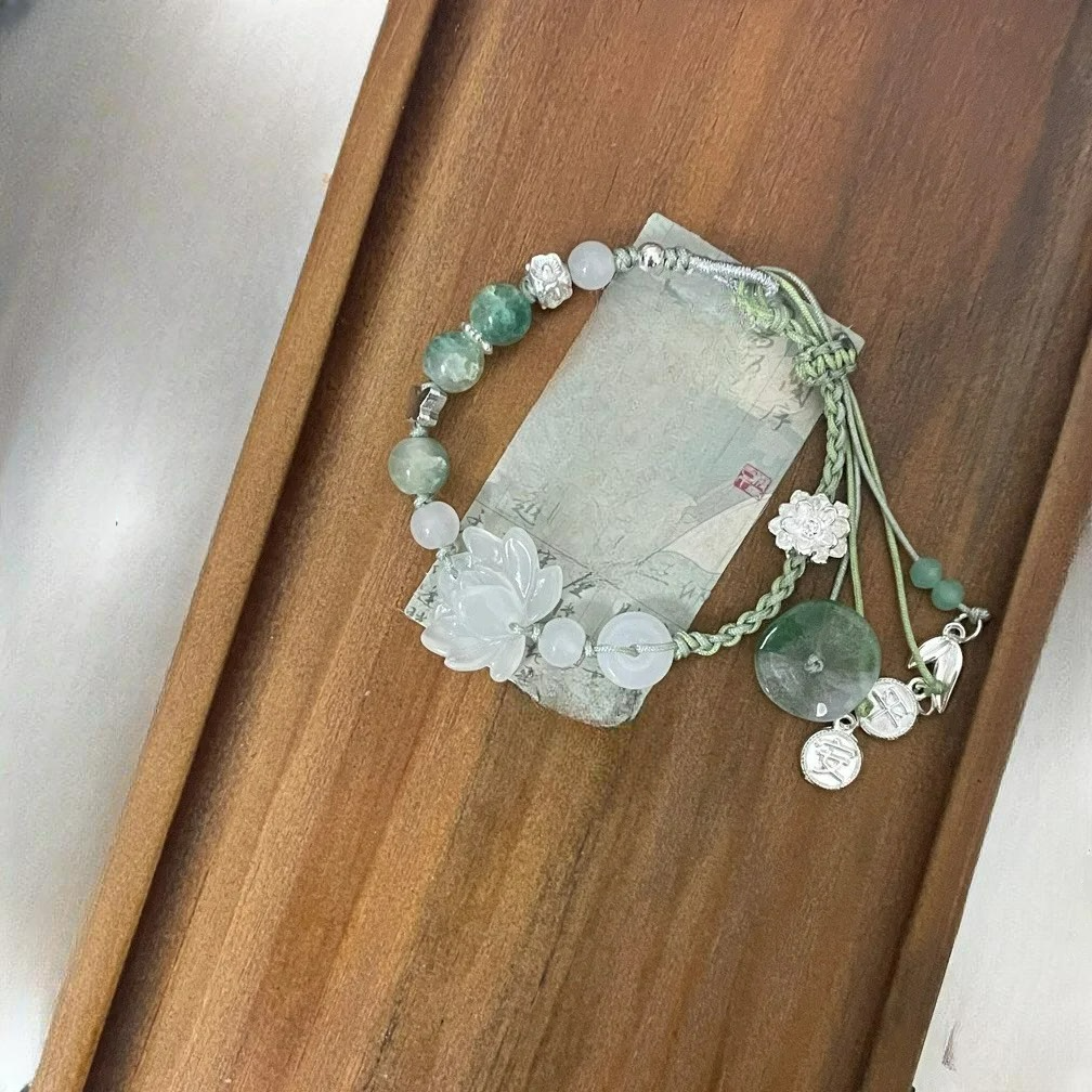 Pulsera de cuerda con cuentas y flor de loto