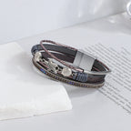 Pulsera de cuero con concha y estrella de mar gris