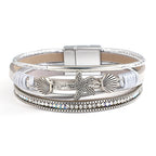 Pulsera de cuero con concha y estrella de mar plata