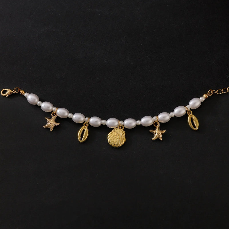 Pulsera de Perlas con Conchas