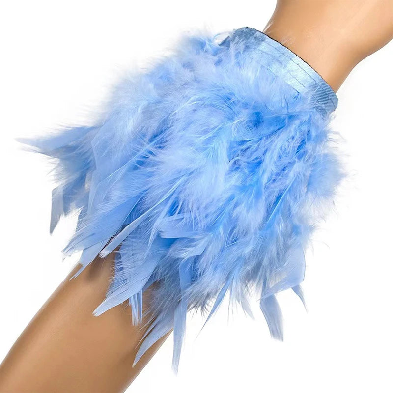 Pulsera con pluma rosa vaporosa azul