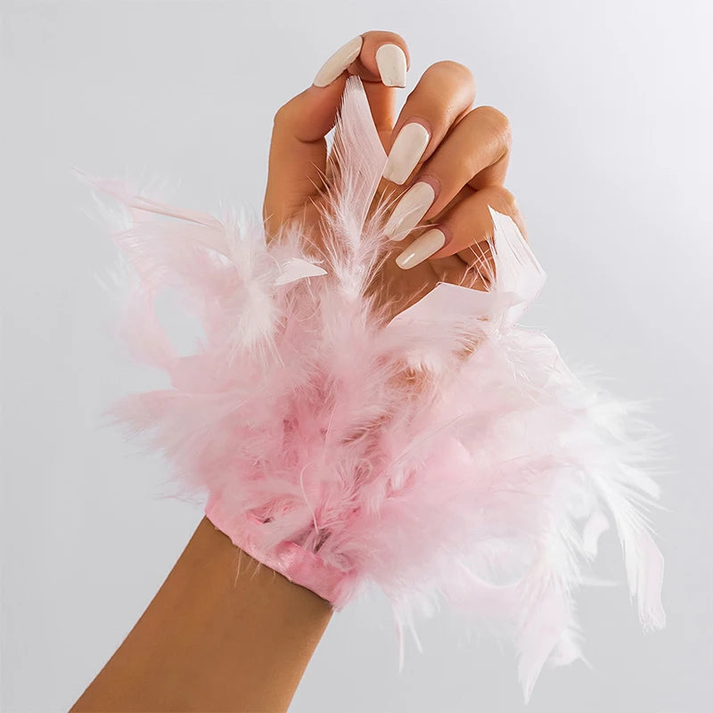 Pulsera con pluma rosa vaporosa rosa