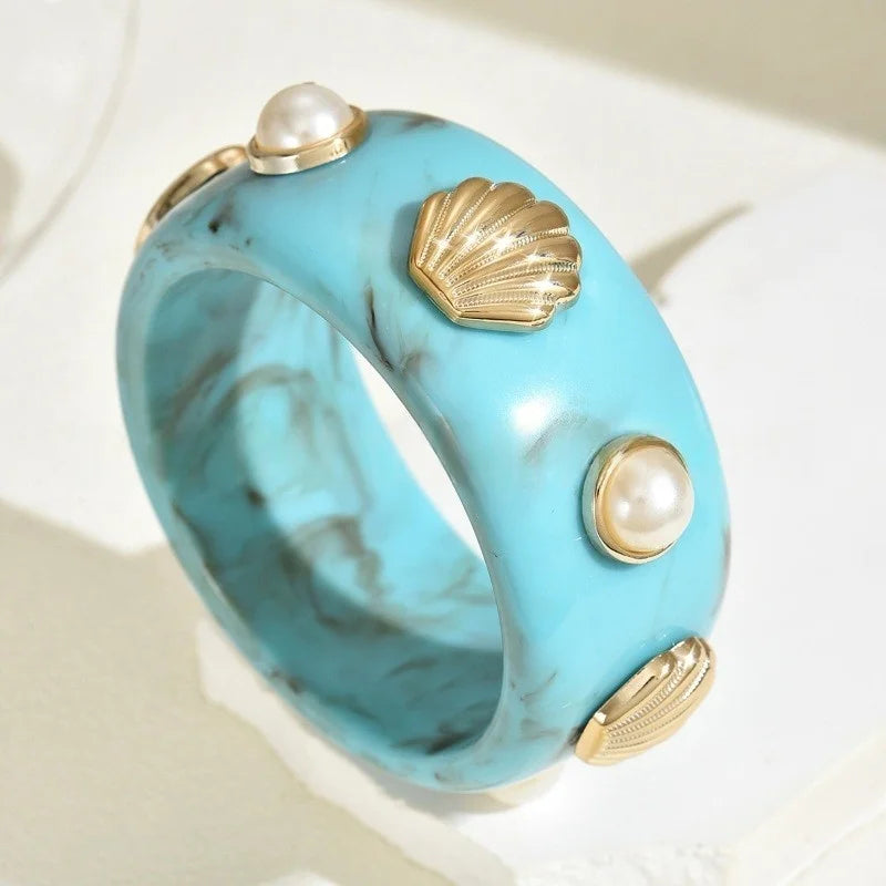 Pulsera de resina con concha azul