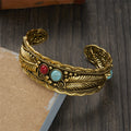 Pulsera Étnica Vintage con Piedras y Plumas oro