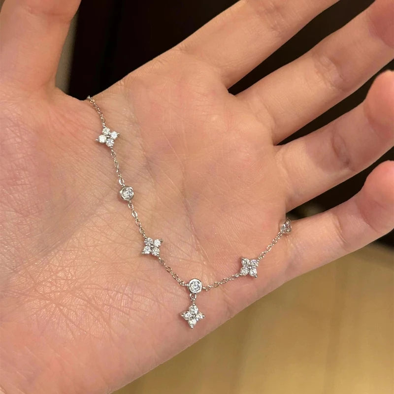 Pulsera Gourmette con Finas Flores en Zircon plata