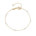 Pulsera fina de cadena con perlas blancas