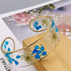 Pulsera Gourmette Flor en Resina Transparente azul a