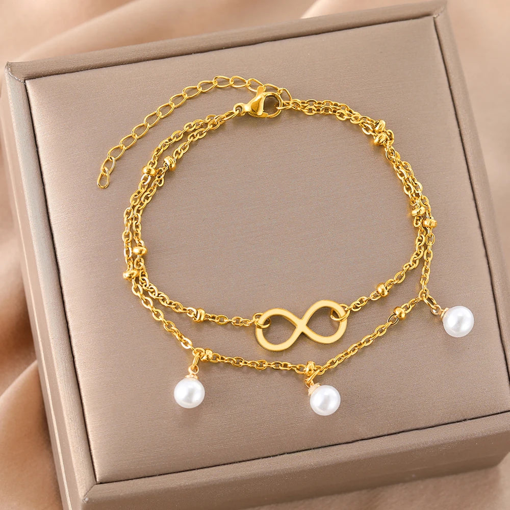 Pulsera Infinita Perlas oro
