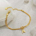 Pulsera inicial y lazo - letra 