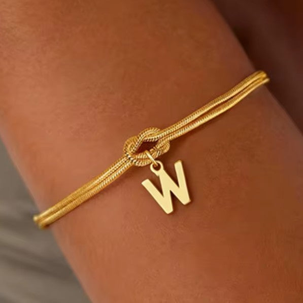 Pulsera inicial y lazo - letra 