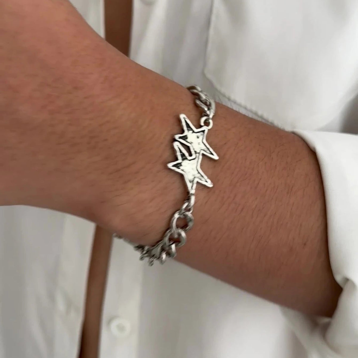 Pulsera de malla cubana con doble estrella de plata