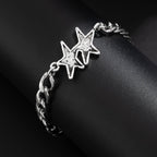 Pulsera de malla cubana con doble estrella de plata