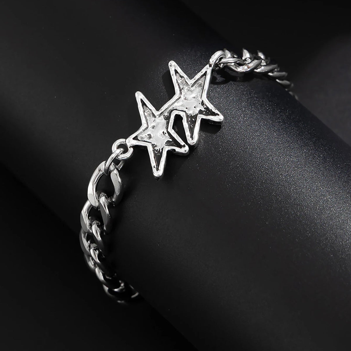 Pulsera de malla cubana con doble estrella de plata