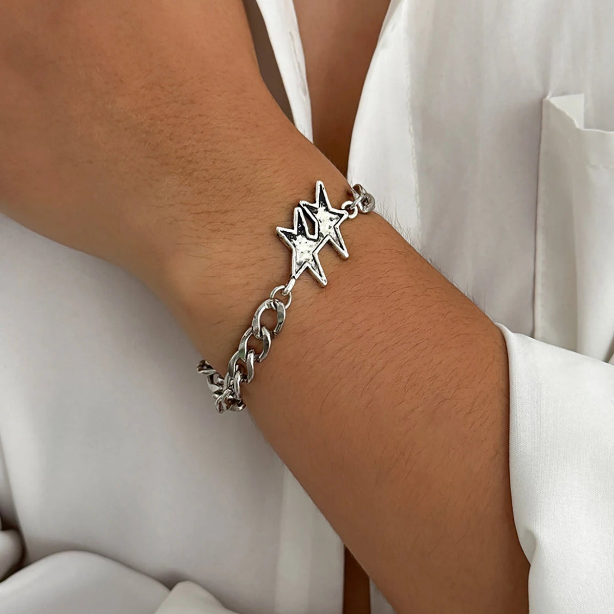 Pulsera de malla cubana con doble estrella de plata