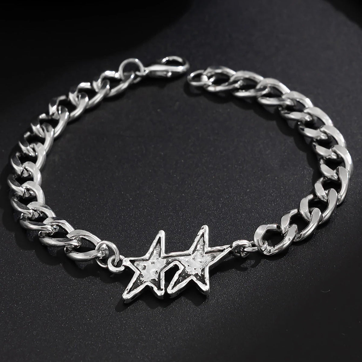 Pulsera de malla cubana con doble estrella de plata