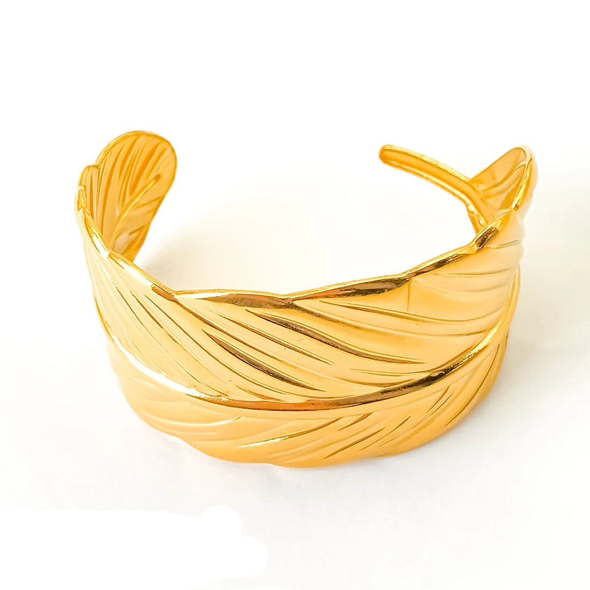 Pulsera brazalete pluma dorada