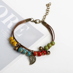 Pulsera marrón con hoja otoñal