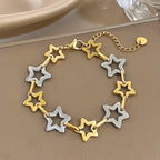 Pulsera multiestrellas geométricas de oro y plata