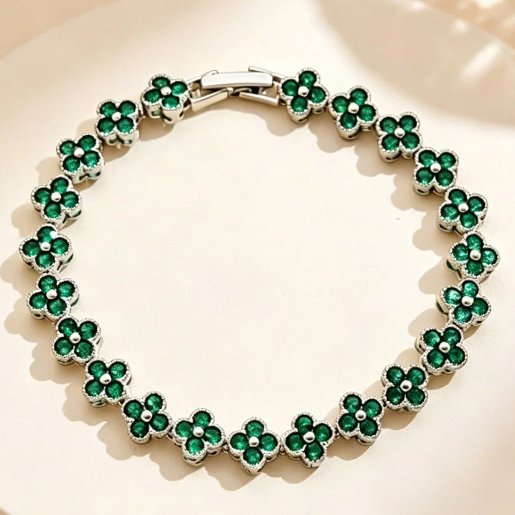 Pulsera de múltiples tréboles con cristales de colores plateado y verde