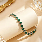Pulsera de múltiples tréboles con cristales de colores plateado y verde