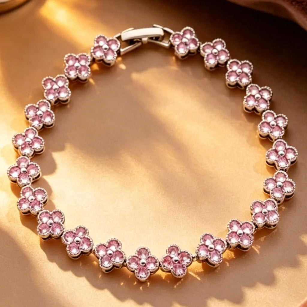 Pulsera de múltiples tréboles con cristales de colores dorado y rosa