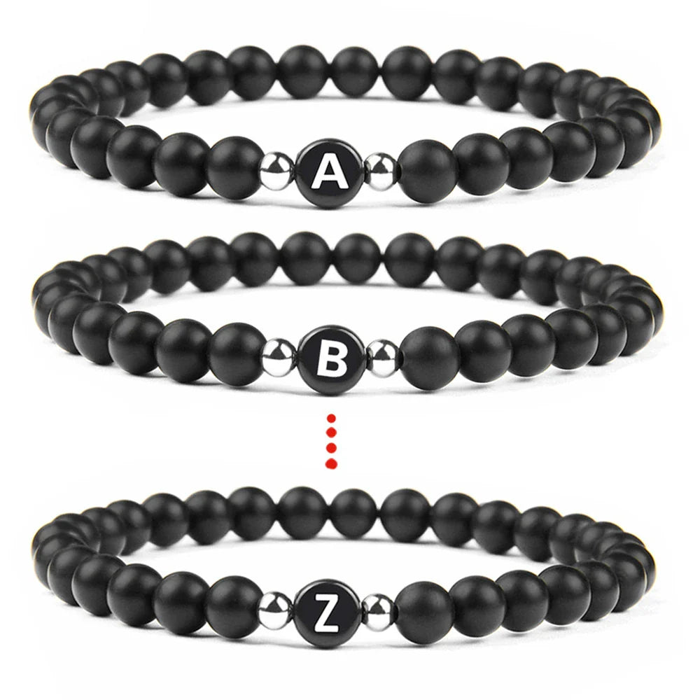 Pulsera negra inicial