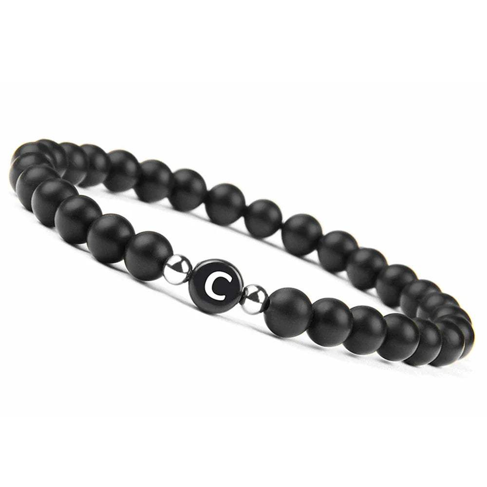 Pulsera negra inicial c