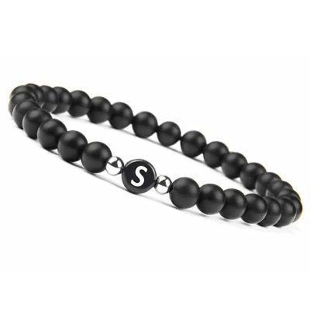 Pulsera negra inicial s