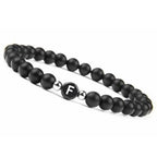 Pulsera negra inicial f