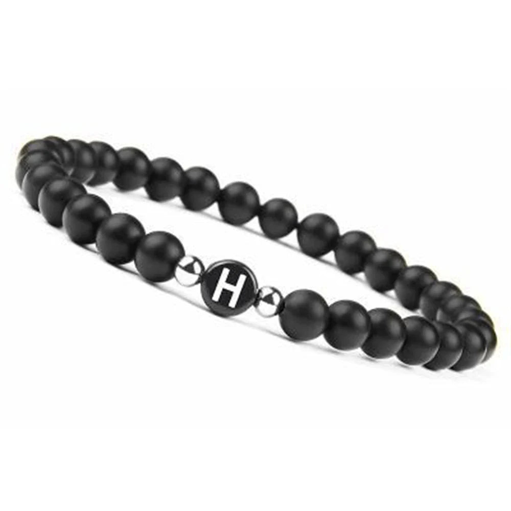 Pulsera negra inicial h